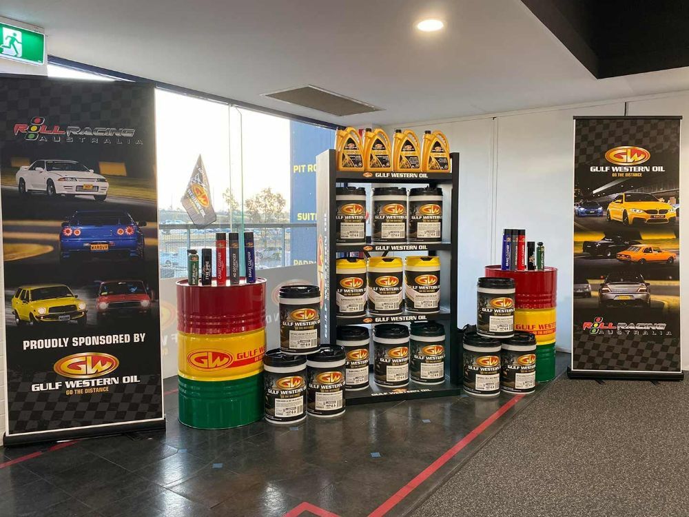 A Room Filled with Barrels of Oil and A Display of Oil — Wades Distributors In Cairns, QLD