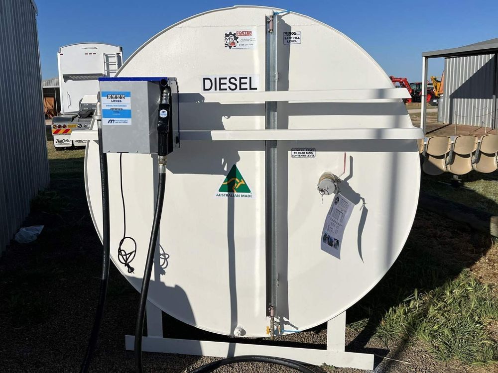 A Diesel Tank Is Sitting on The Ground in Front of A Building — Wades Distributors In Garbutt, QLD