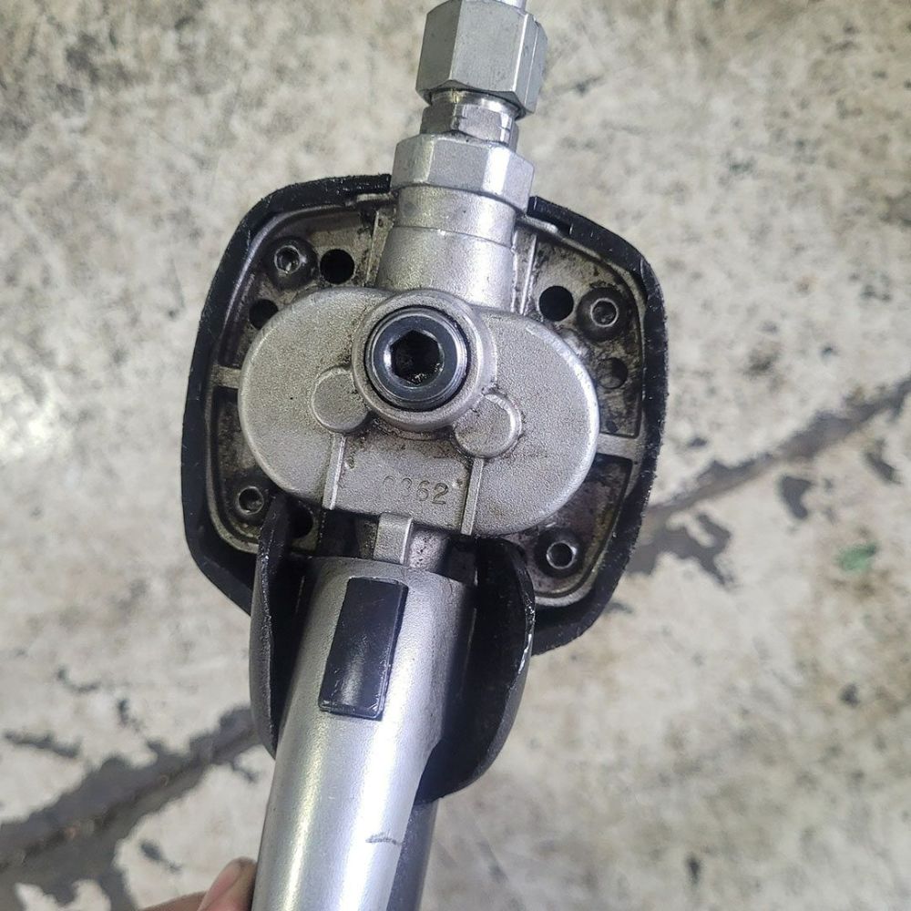 A Person Is Holding a Tool with The Number 132 on It — Wades Distributors In Whitsundays, QLD