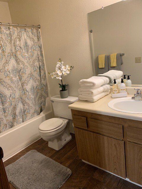 College Glen Bathroom including step in tub with large vanity