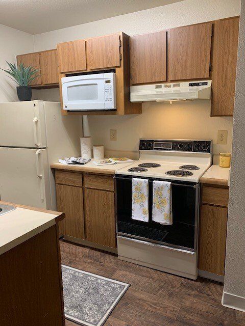 Large Kitchen including Refrigerator, Microwave and Electric Range