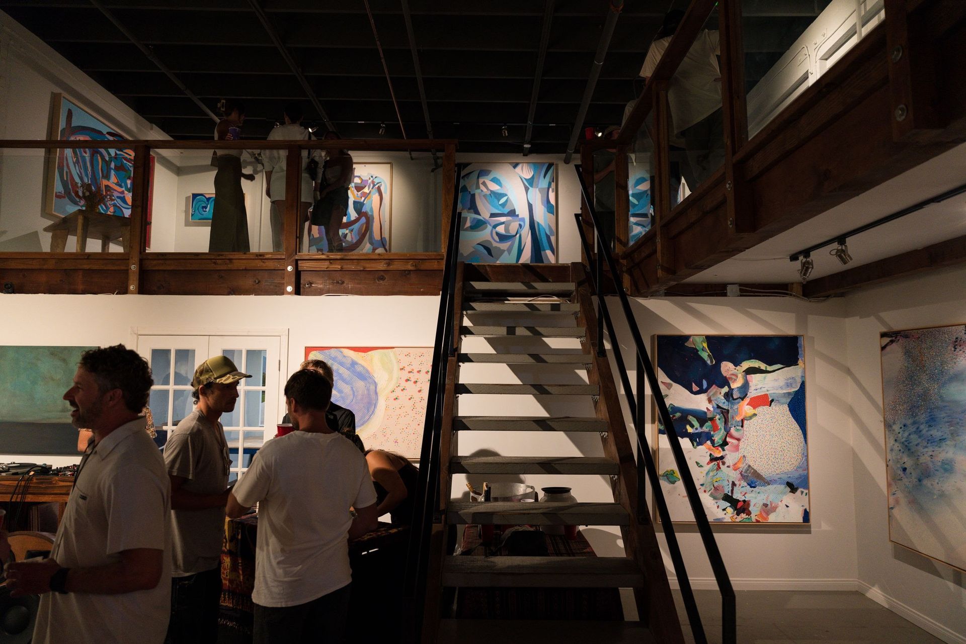 Anchor Art's white glove service in action, setting up an intricate San Diego art exhibit and events.