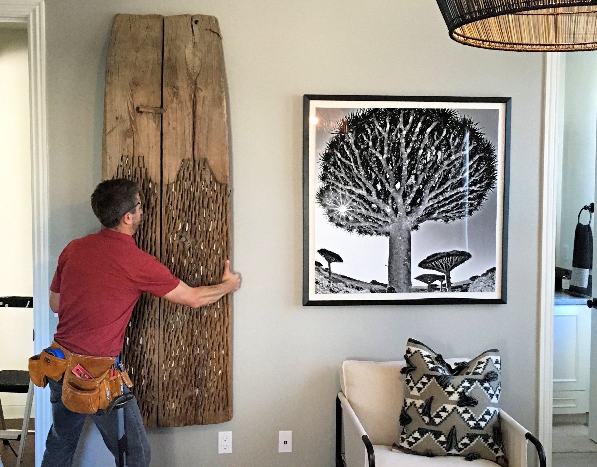 Professional art handlers from Anchor Art Logistics installing a sculpture in San Diego