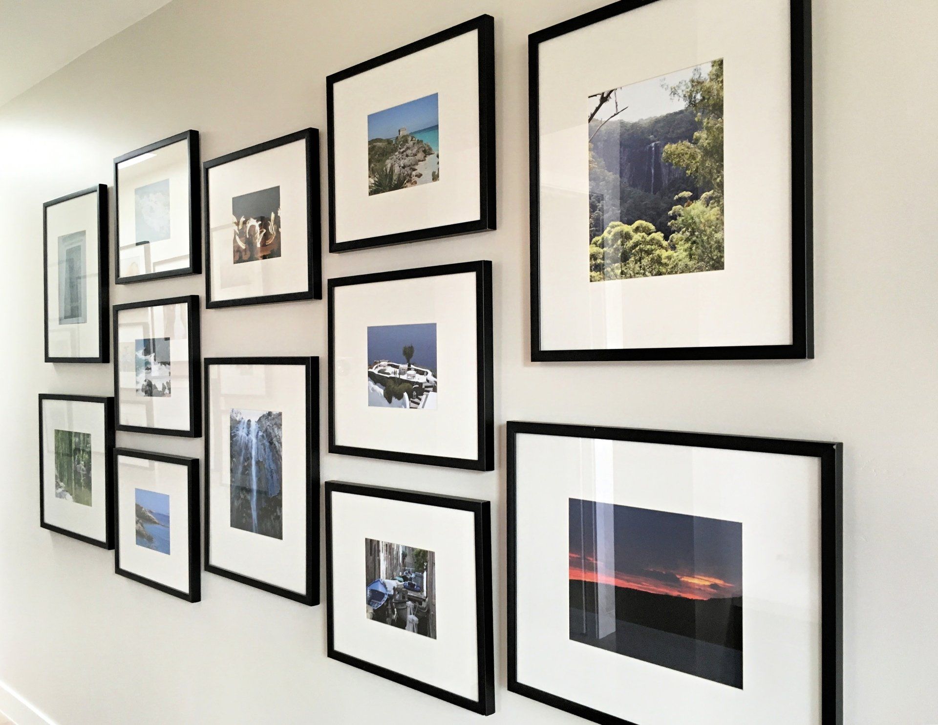 Gallery setup and artwork arrangement by Anchor Art installation professionals