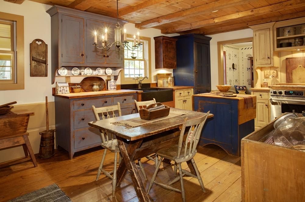 Custom farm style reclaimed wood kitchen cabinets.