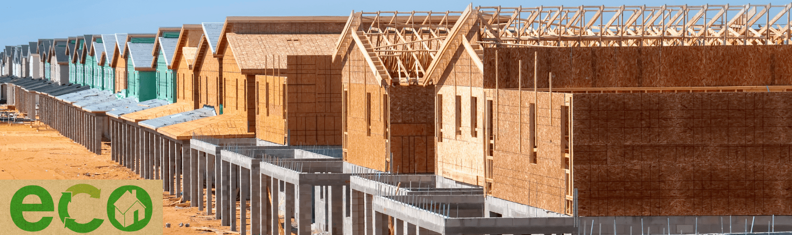 A row of wooden houses under construction with the word eco in the corner