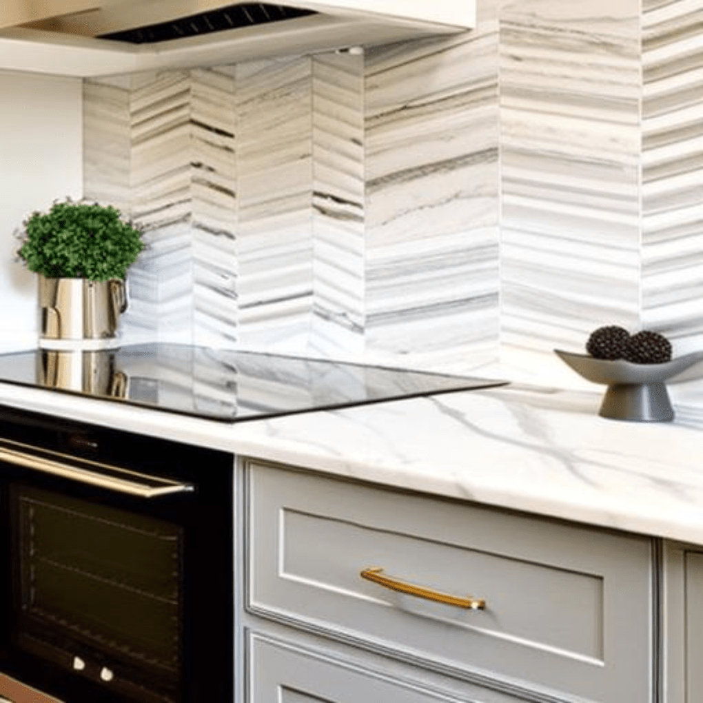 A kitchen with a stove top oven and marble counter tops.