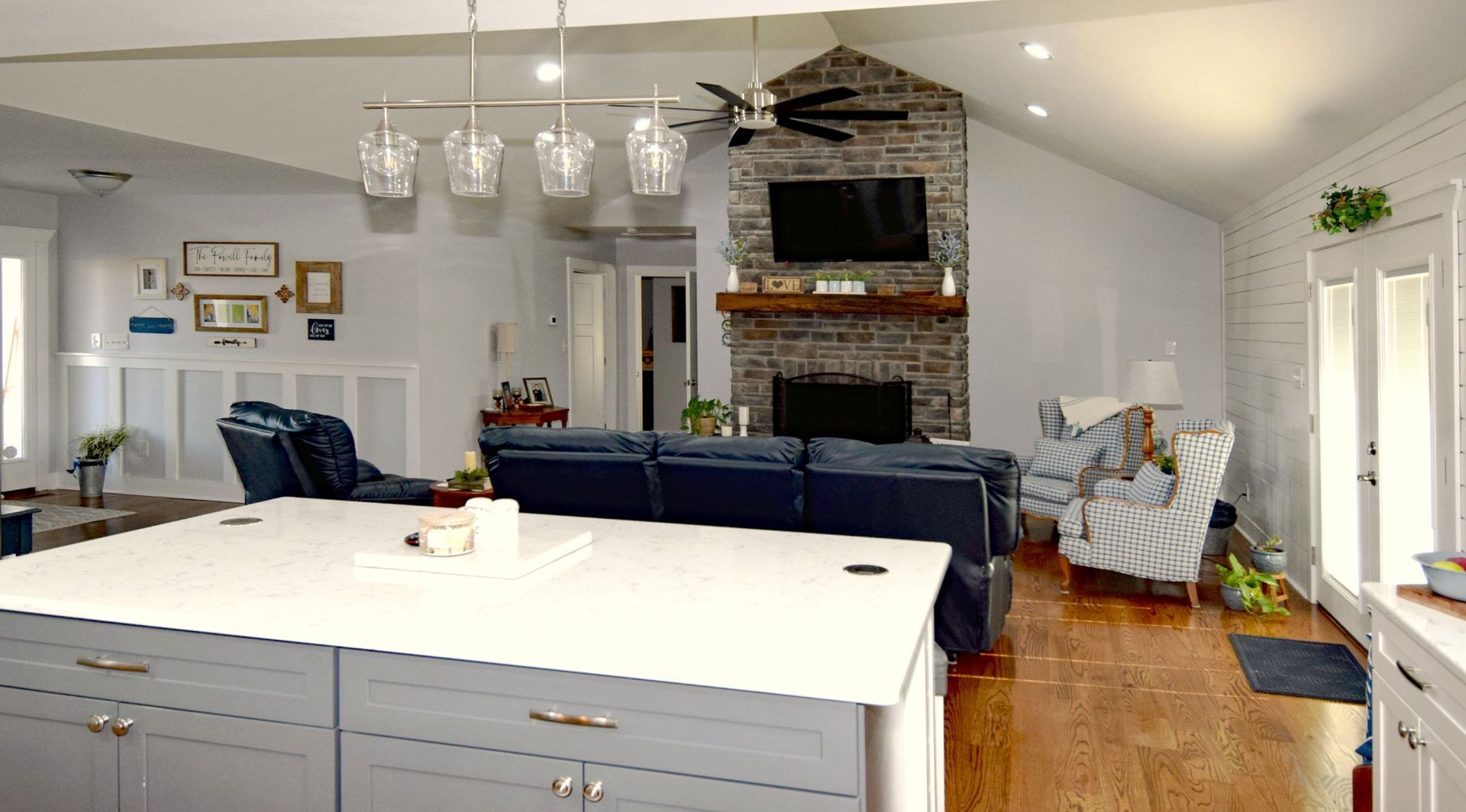 There is a large island in the middle of the living room.