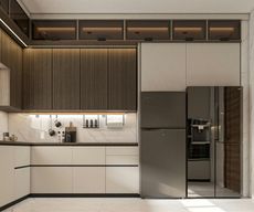 Modern kitchen with dark brown and white cabinets, stainless steel refrigerator, and marble backsplash.
