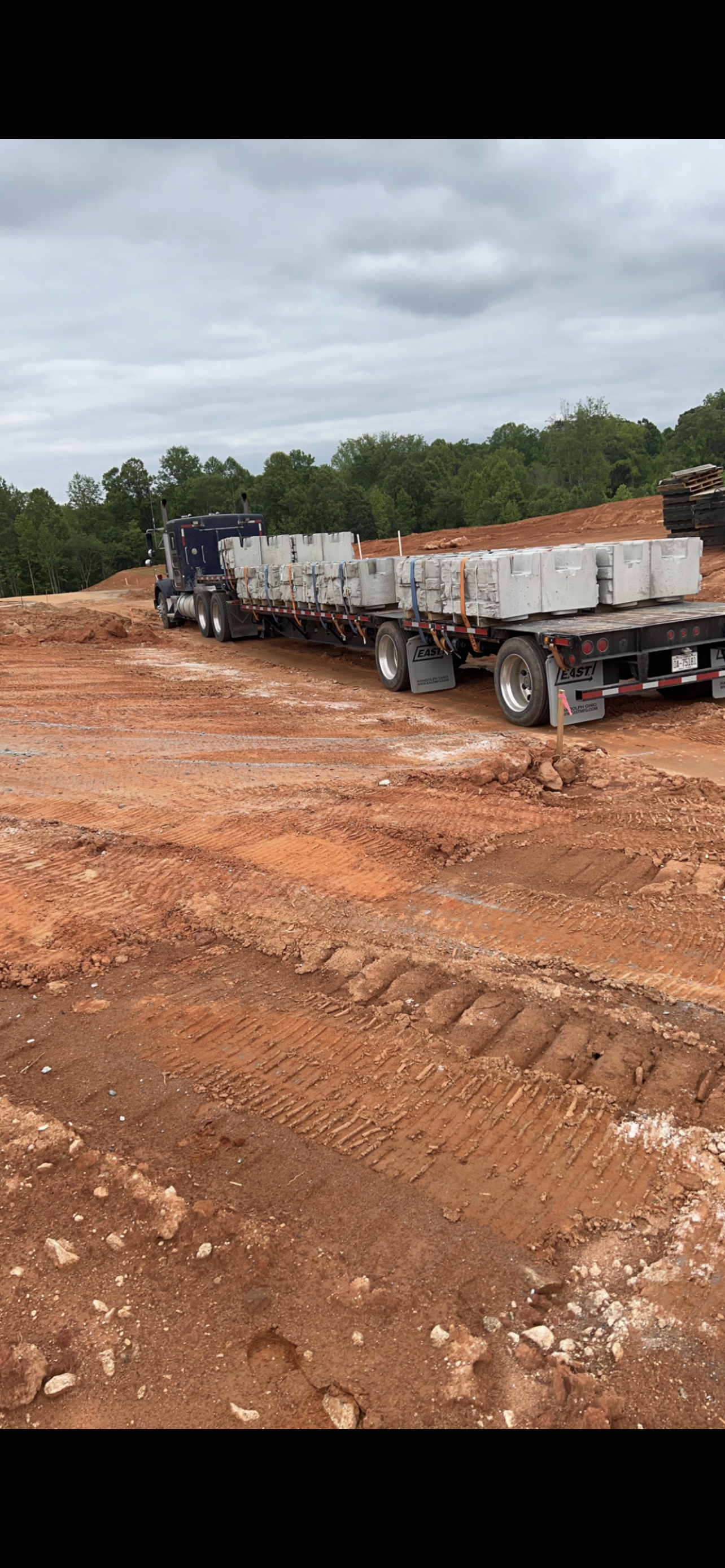 Semi Truck is Driving Down a Dirt Road | Weaverville, NC | Appalachian Trucking LLC