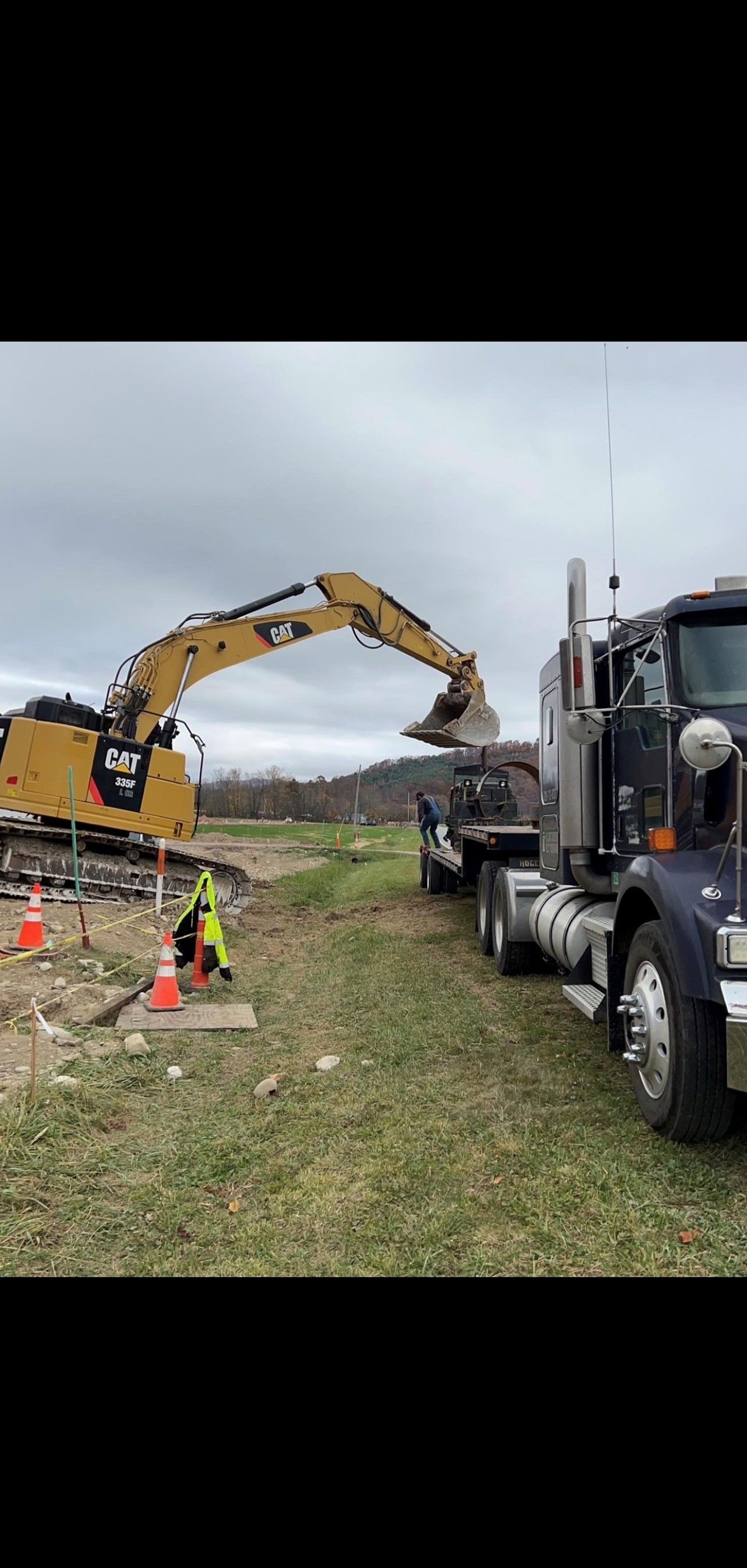 A Bulldozer is Digging a Hole in the Ground | Weaverville, NC | Appalachian Trucking LLC