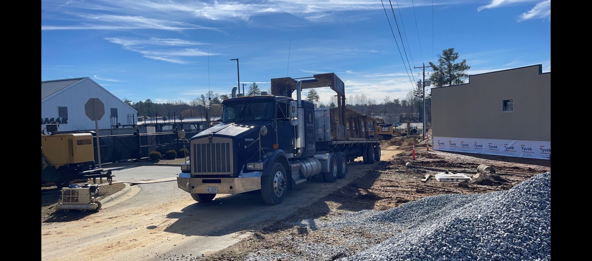 A Semi Truck is Driving Down a Dirt Road at a Construction Site | Weaverville, NC | Appalachian Trucking LLC