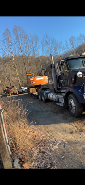 Semi Truck is Parked on the Side of the Road Next to a Bulldozer | Weaverville, NC | Appalachian Trucking LLC