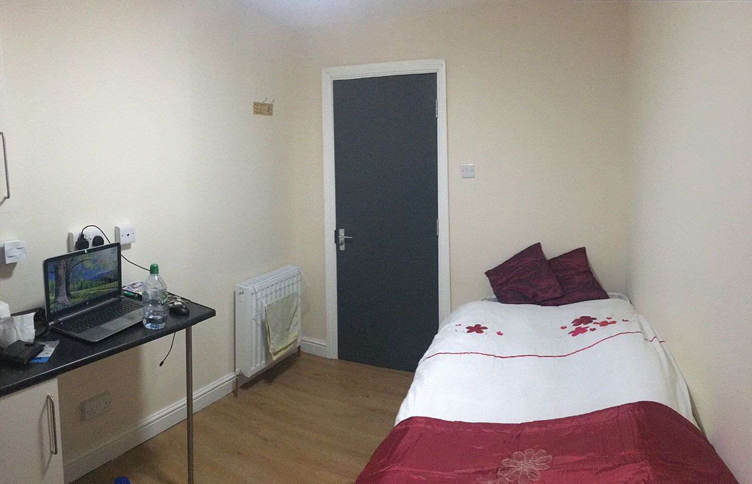 small room with a bed