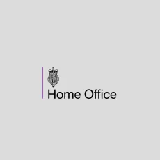 Home Office logo: Black text with a crown symbol and a purple line, on a gray background.