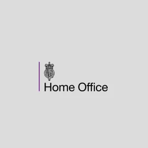Home Office logo: Black text with a crown symbol and a purple line on a gray background.