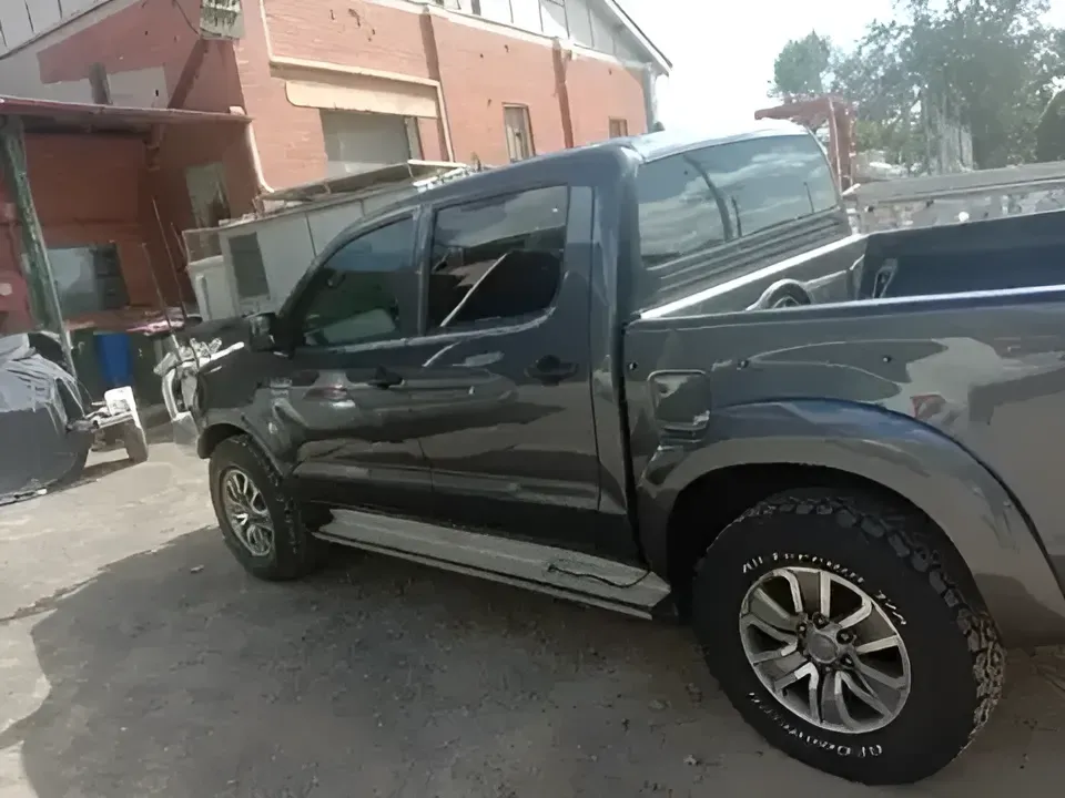 A Gray Truck Is Parked In Front Of A Building — SteelBar Restoration In Yarraman, QLD