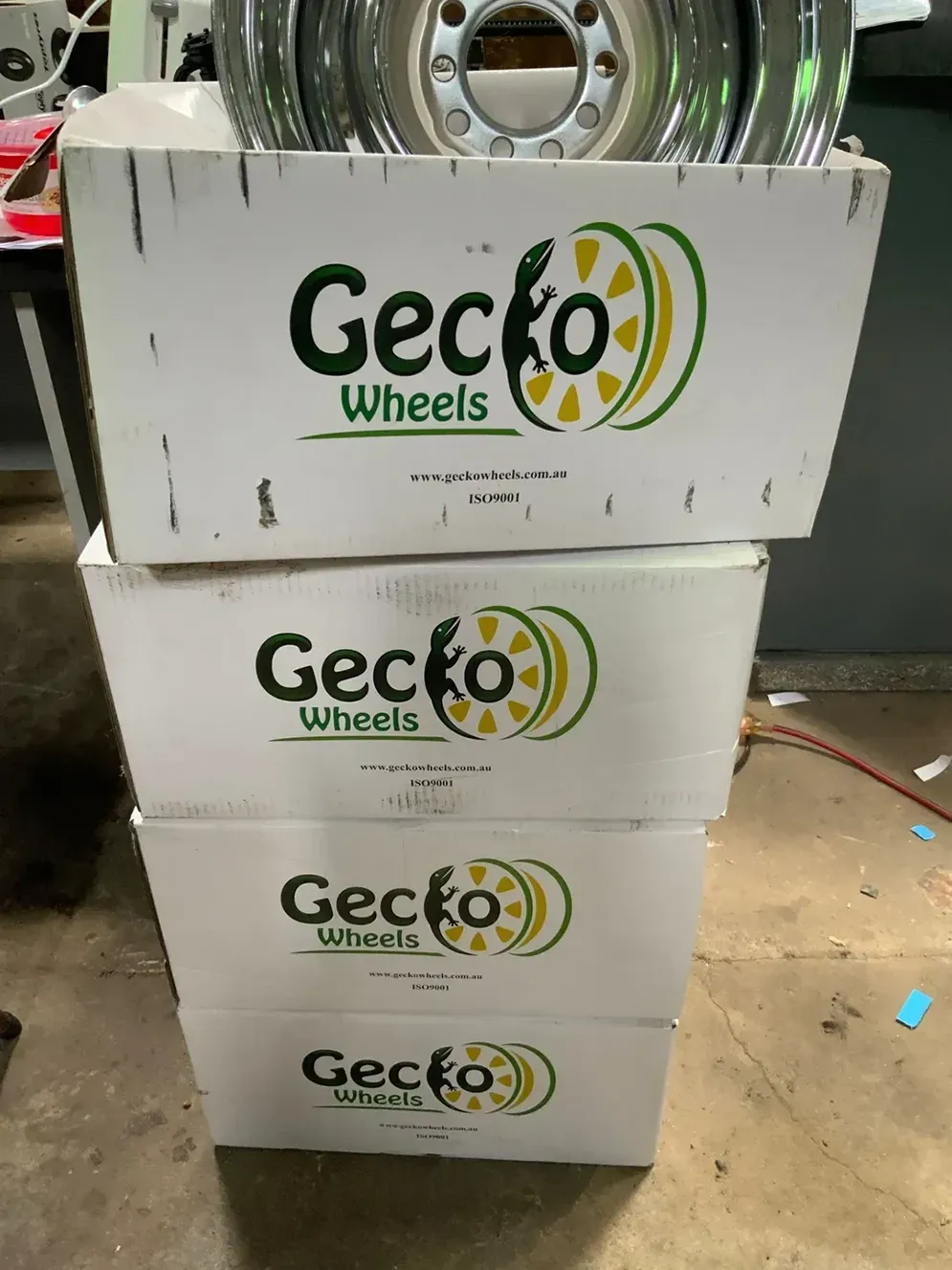 Three Boxes Of Gecko Wheels Are Stacked On Top Of Each Other — SteelBar Restoration In Yarraman, QLD