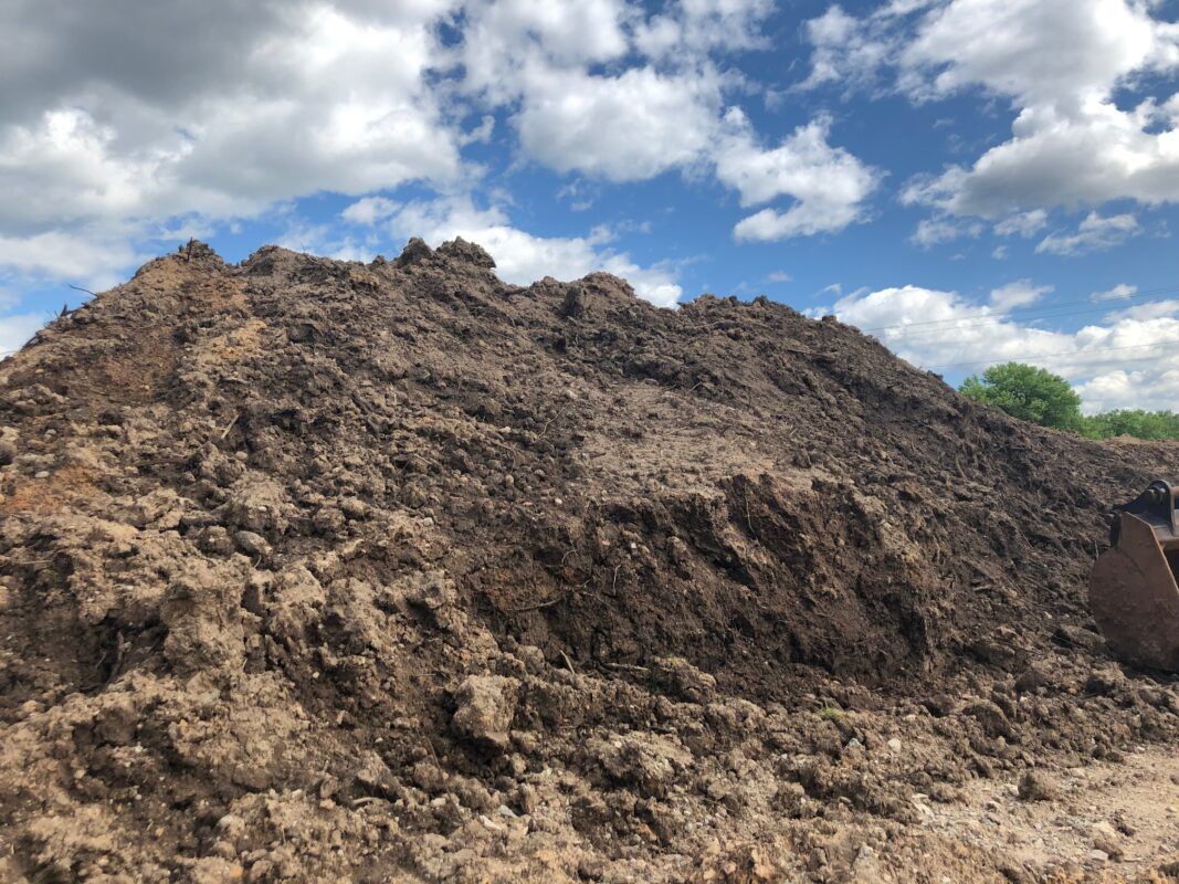 Rocks, Clay, and other clean material used to fill in large areas or change existing grade.