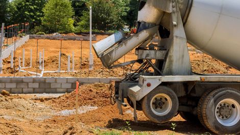 A street with a yellow sign on the side of it.