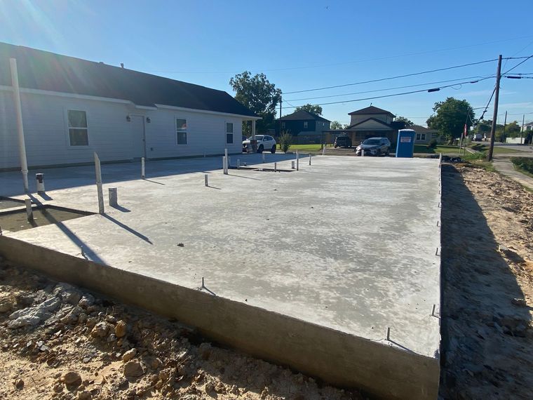 A large building with a handicapped parking spot in front of it
