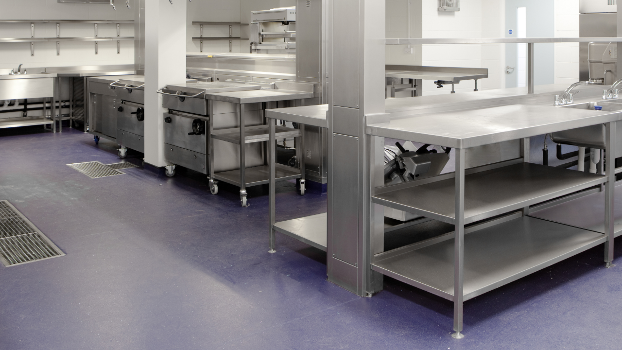 A parking lot with a handicap sign painted on it