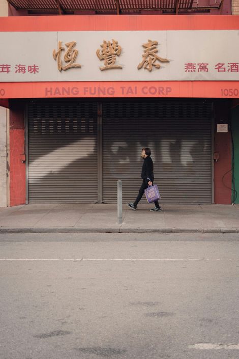 A parking lot with a yellow line on the side of the road.