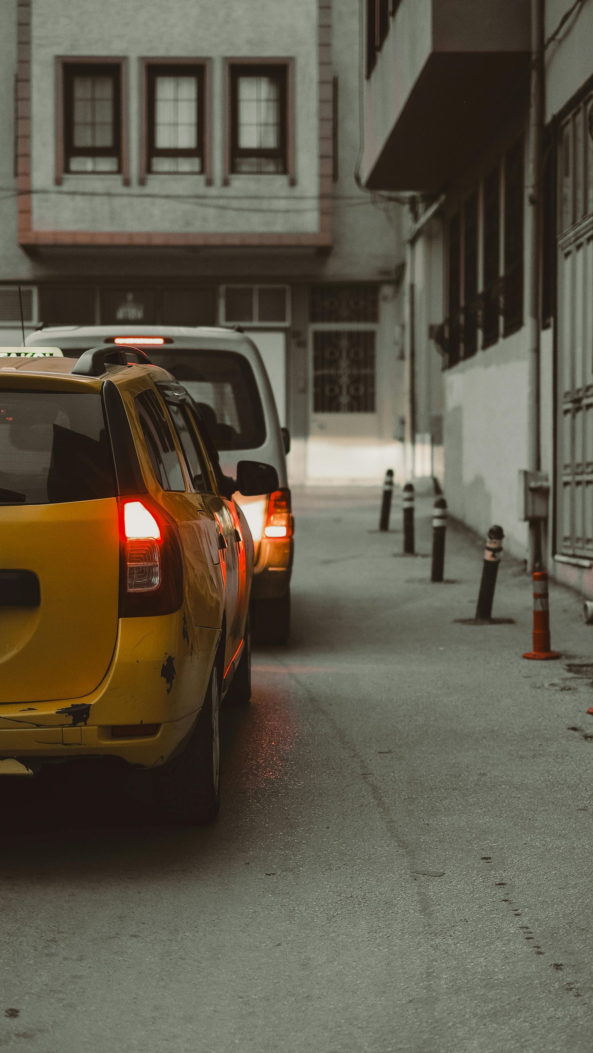 A parking lot with a yellow line on the side of the road.