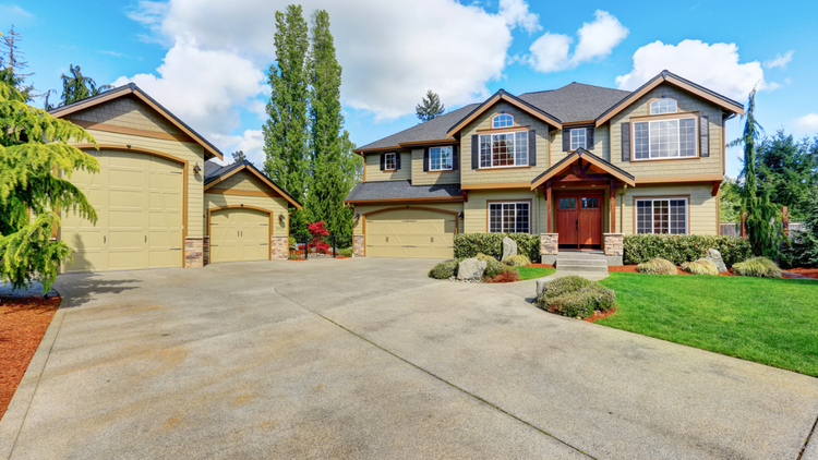 A shadow of a person taking a picture of a road