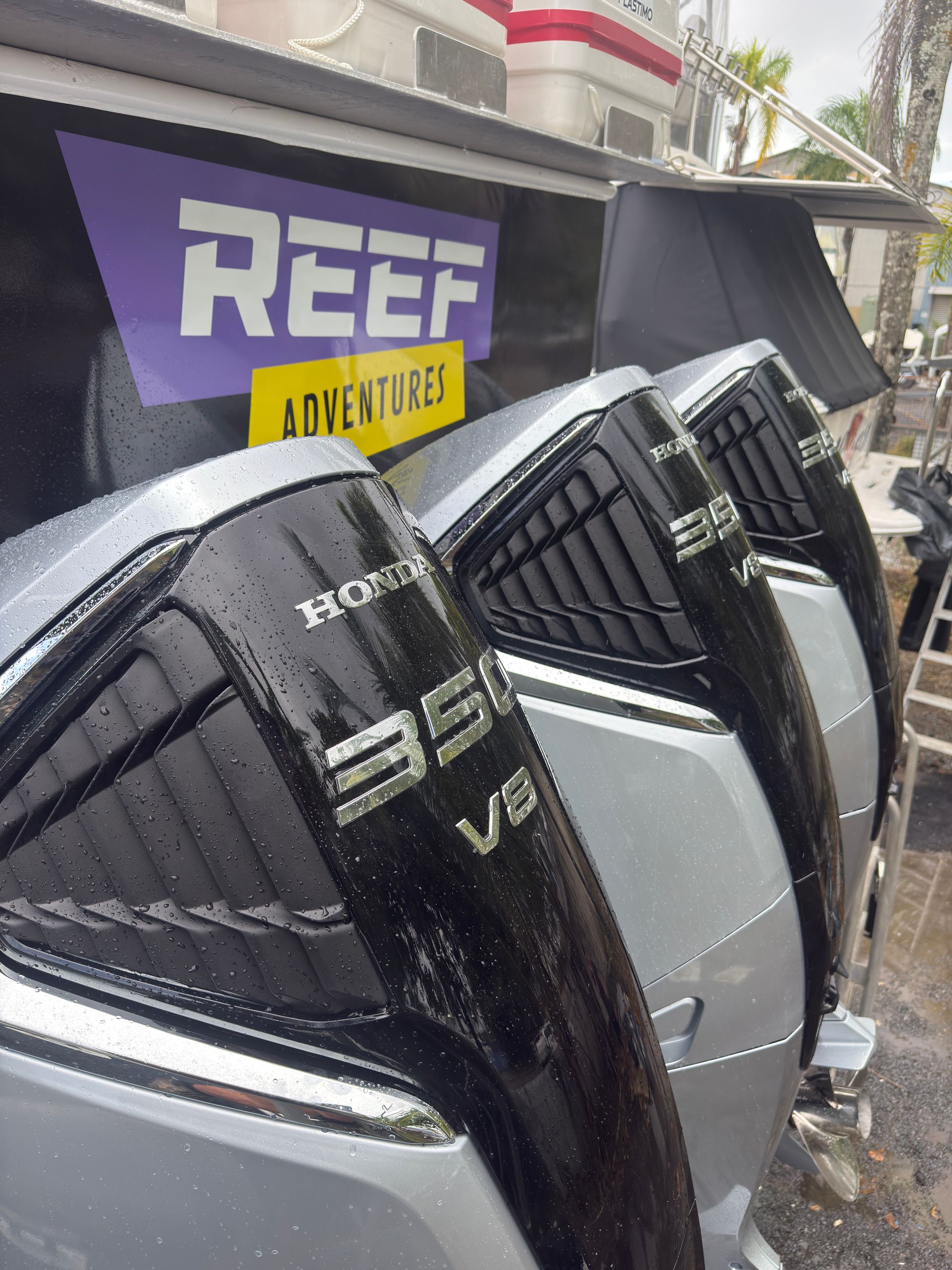 A Boat With A Honda Outboard Motor Is In The Water — HiTune Marine In Bentley Park, QLD