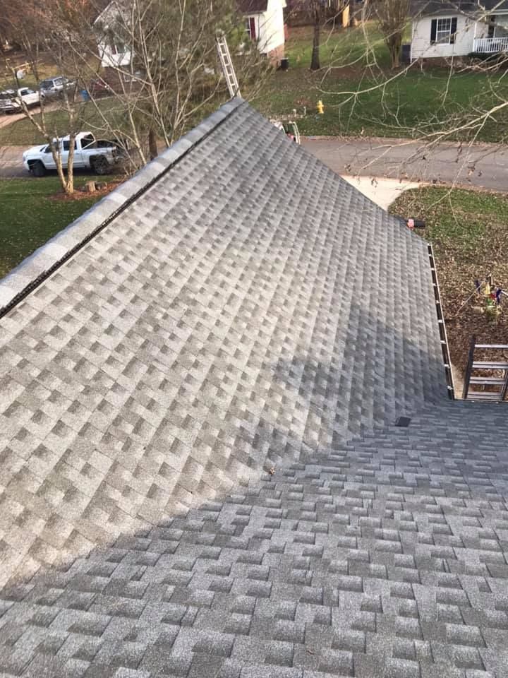 A roof with a truck parked on the side of it.