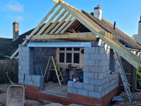 Extension with bricks and wood.