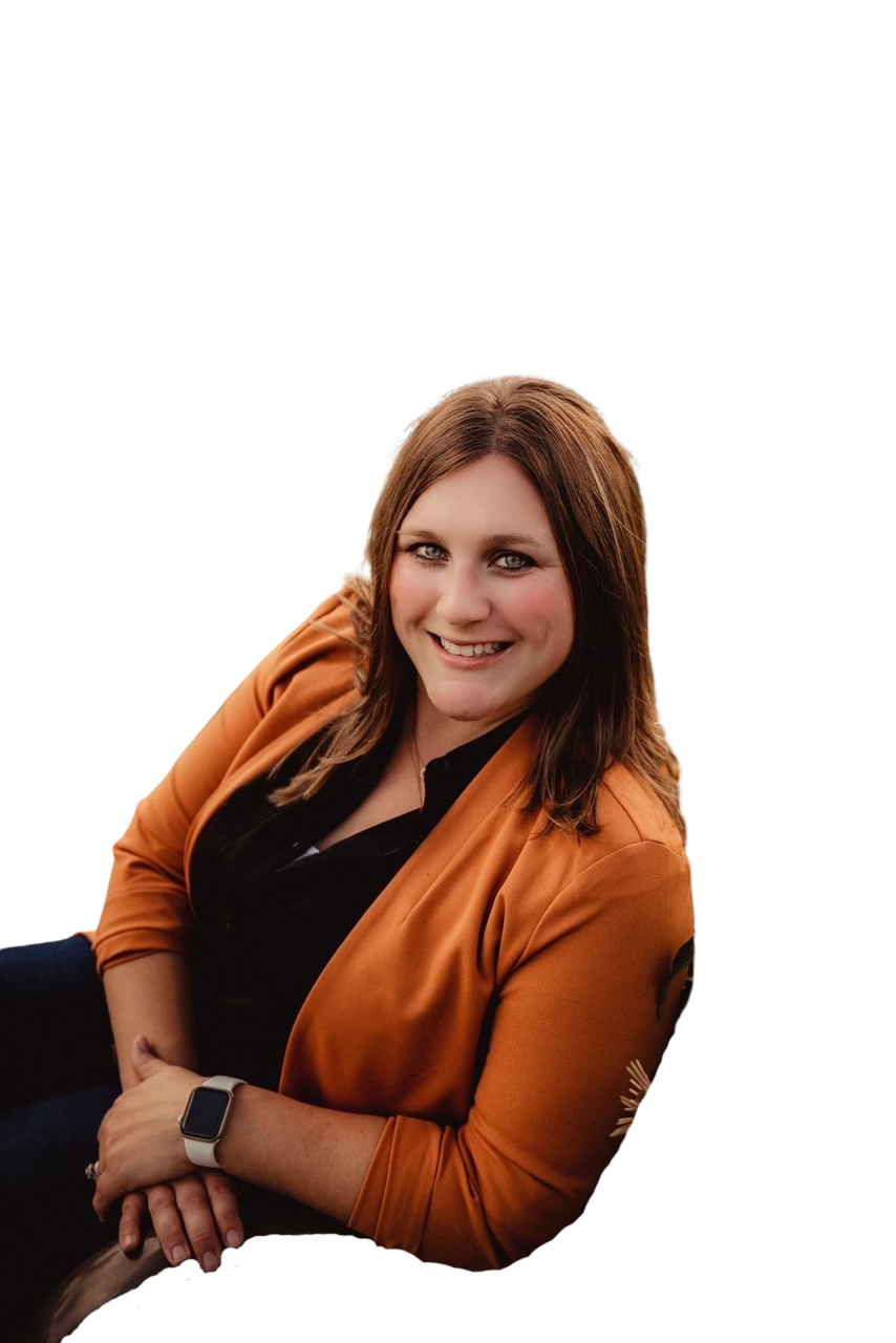 Bald man smiling, wearing gray Under Armour polo shirt, head and shoulders.