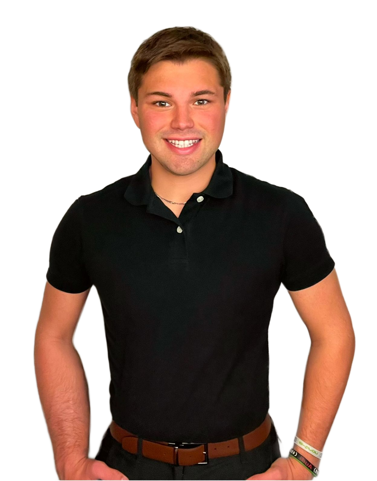 Bald man smiling, wearing gray Under Armour polo shirt, head and shoulders.