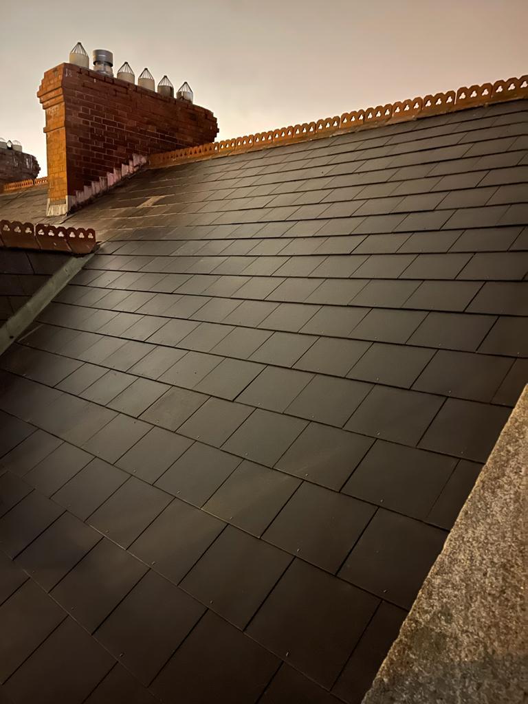 A roof with a chimney on top of it