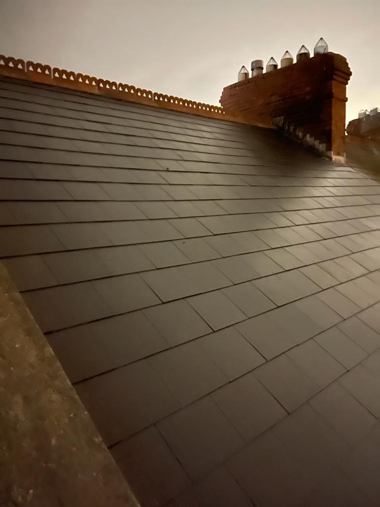 A roof with a chimney on top of it