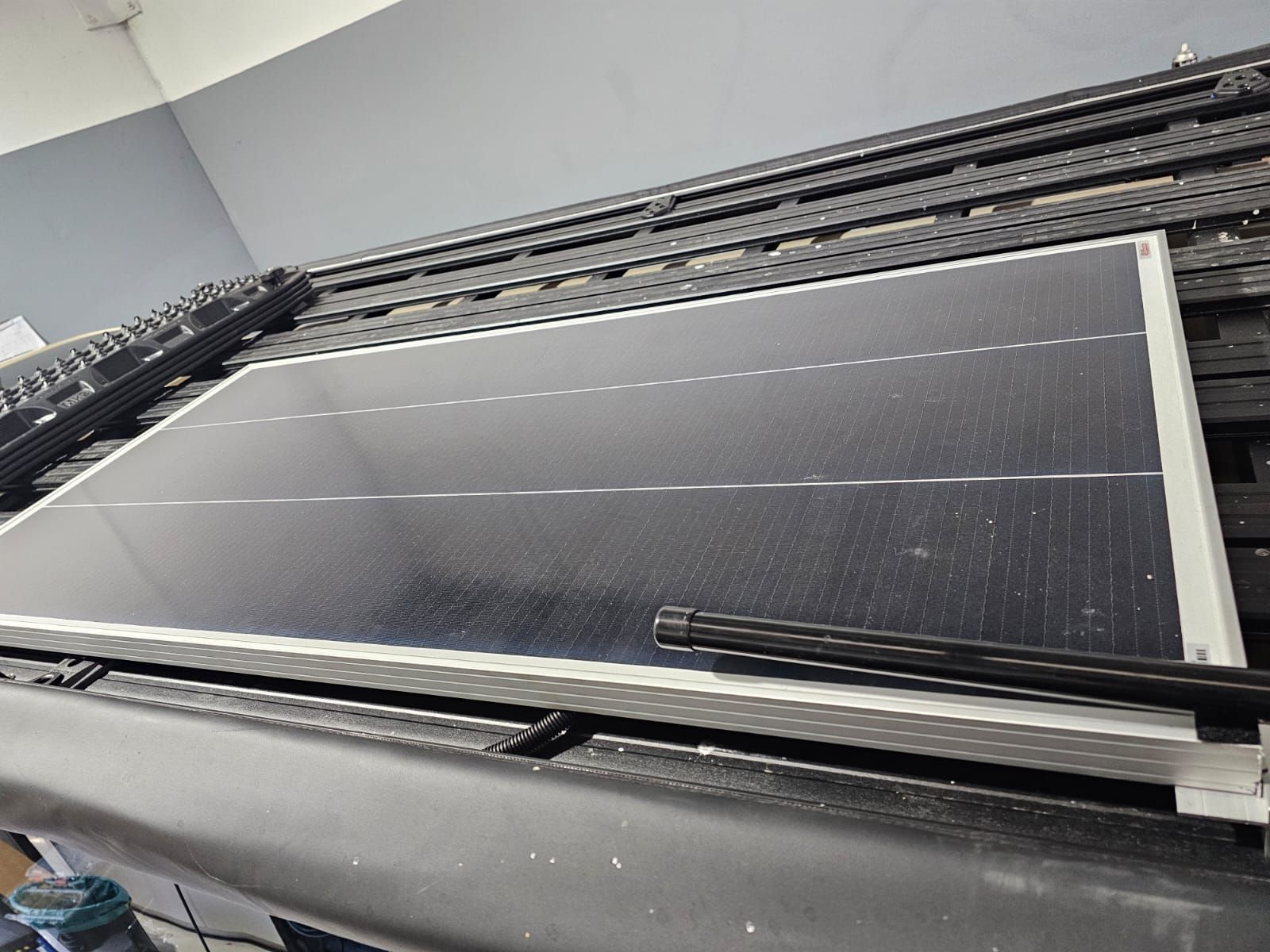 Roof-mounted solar panel  installed on Toyota Hiace for offgrid travel