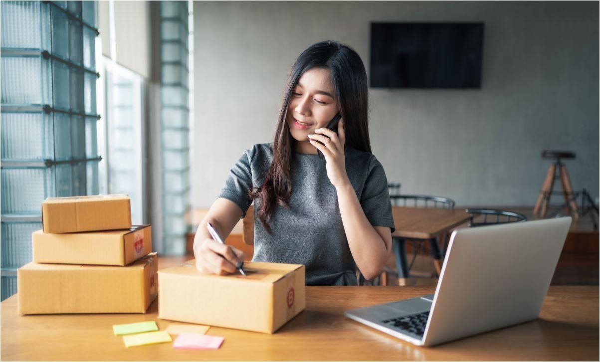Female booking a courier
