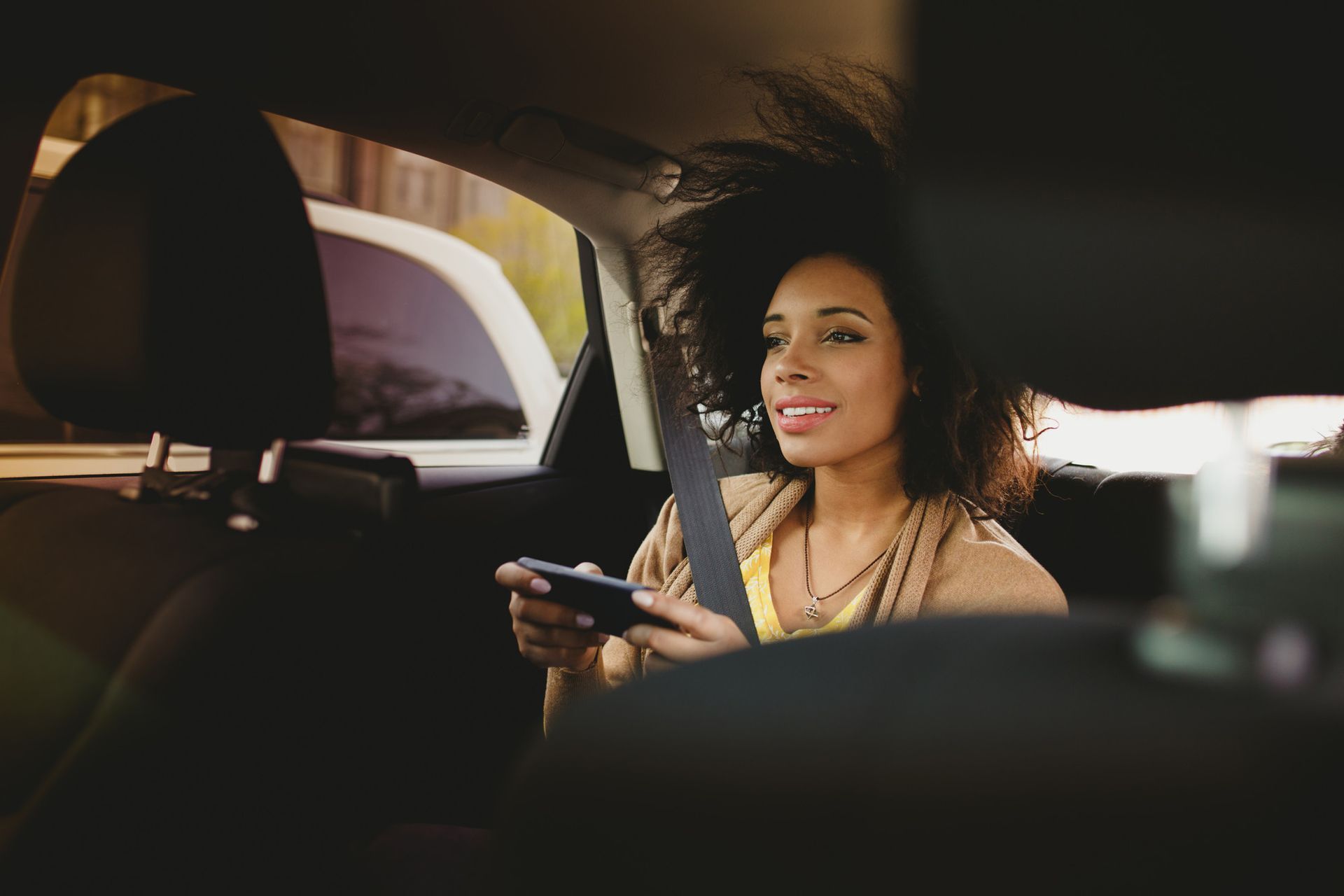 Lady in a taxi