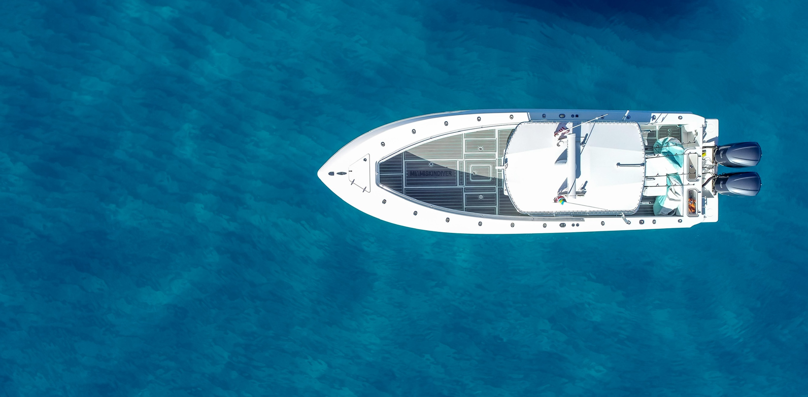 South Florida boat with custom foam boat decking in the beautiful Florida waters.