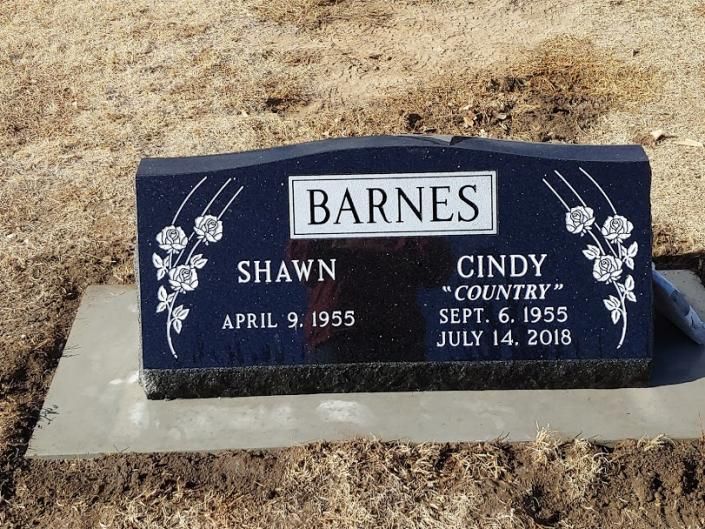 Barnes family gravestone with names Shawn and Cindy in a dry cemetery setting