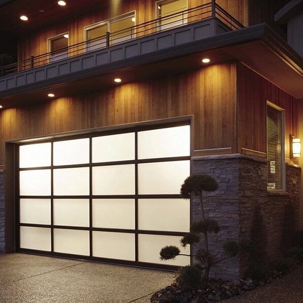 A Large House with A Sliding Glass Garage Door