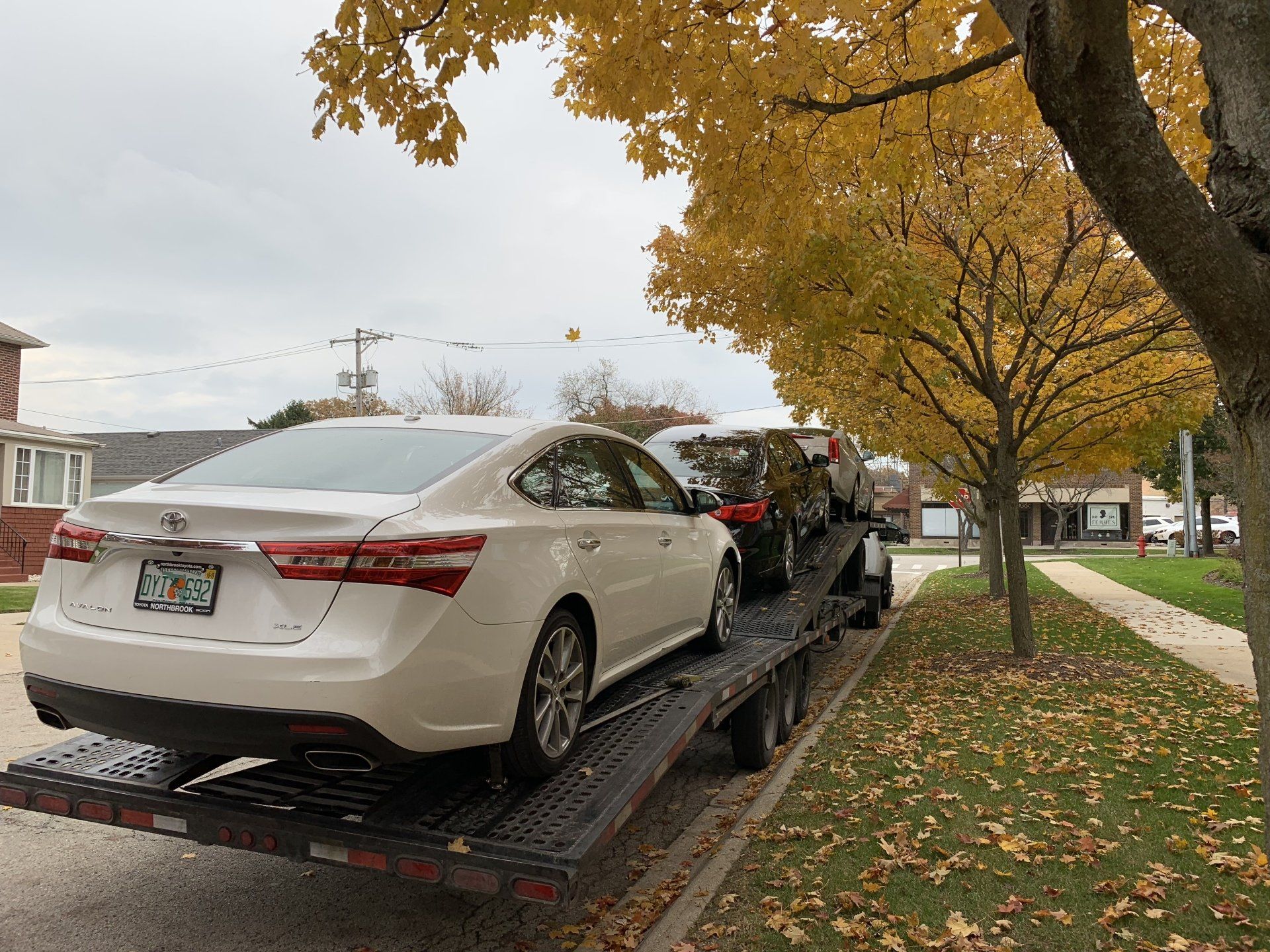 Long Range Vehicle Moving — Back View of a Car Truck Transporter with Vehicles in Chicago, IL