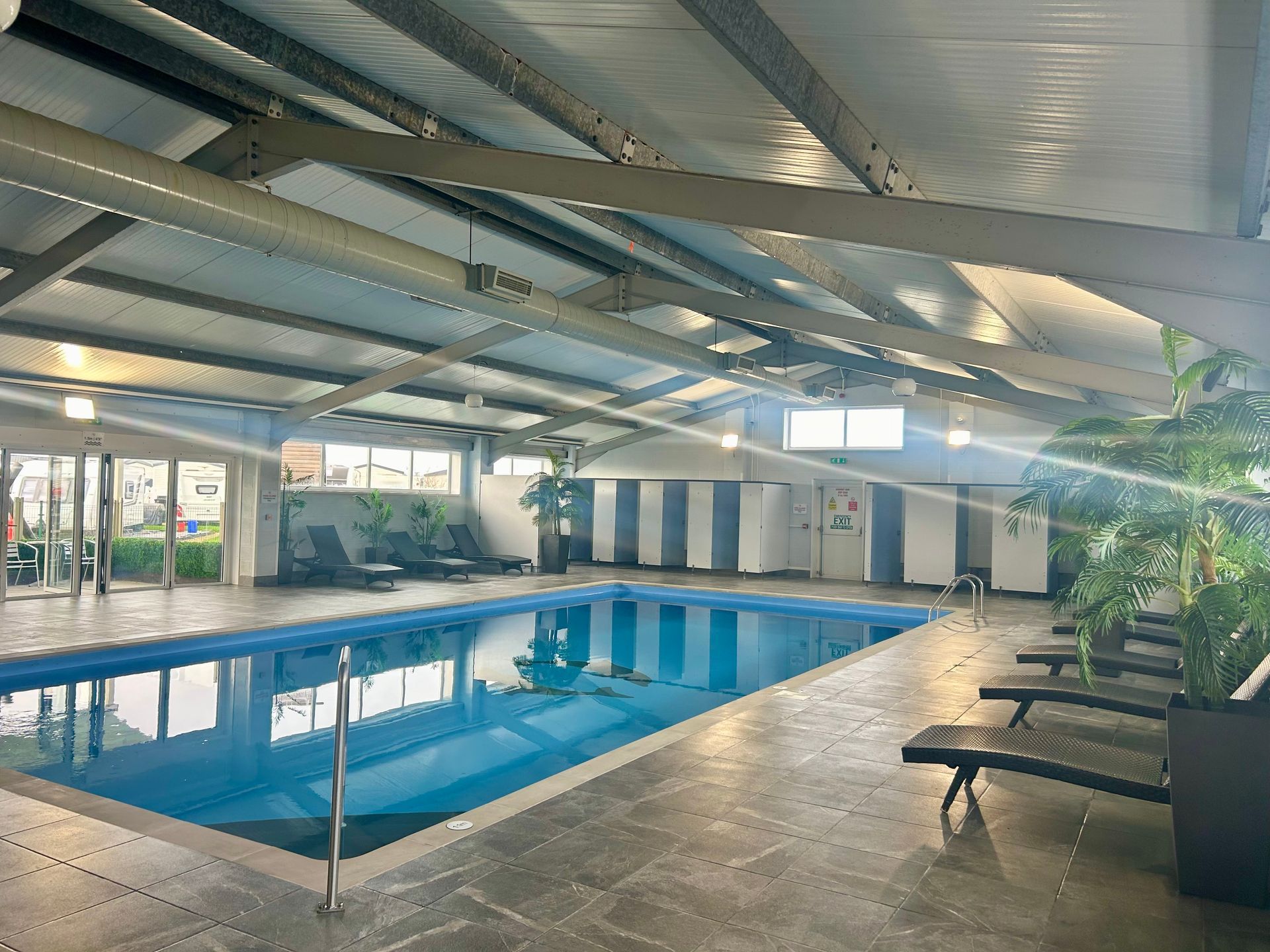 swimming pool with changing cubicles