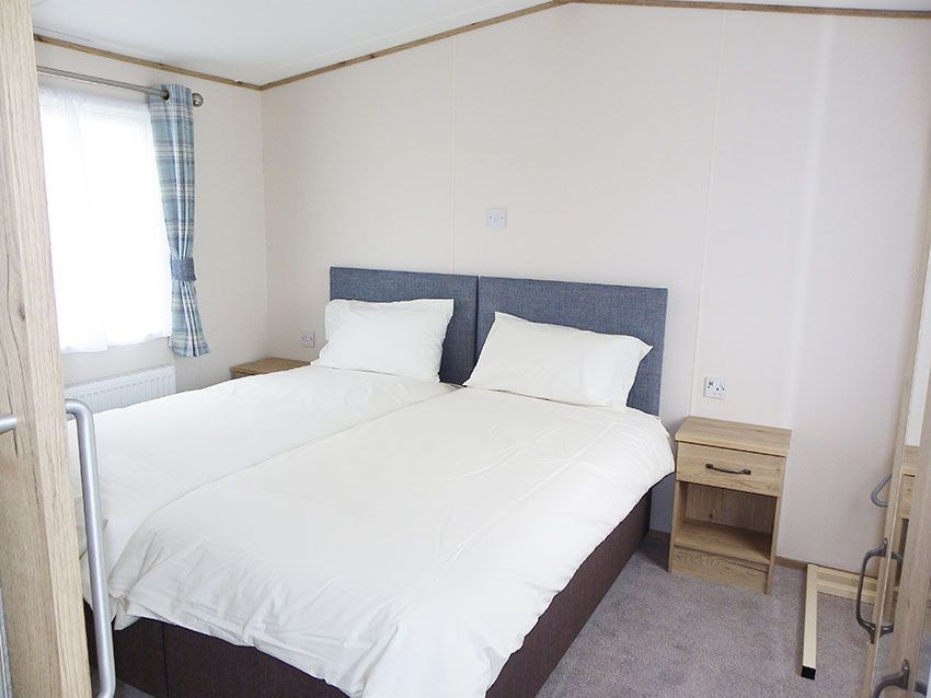 wheelchair accessible holiday caravan bedroom