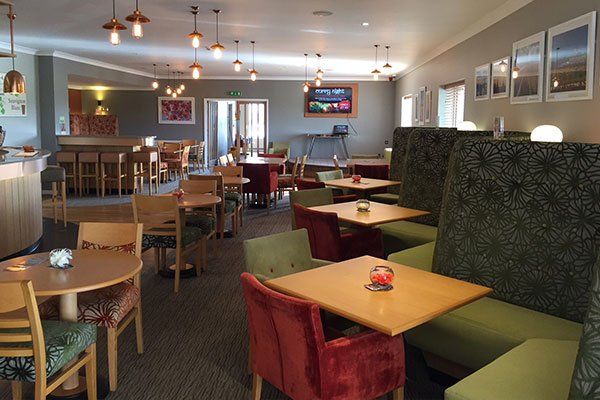 Inside seating area in Windmill bar and bistro at Edithmead holiday park in Somerset.