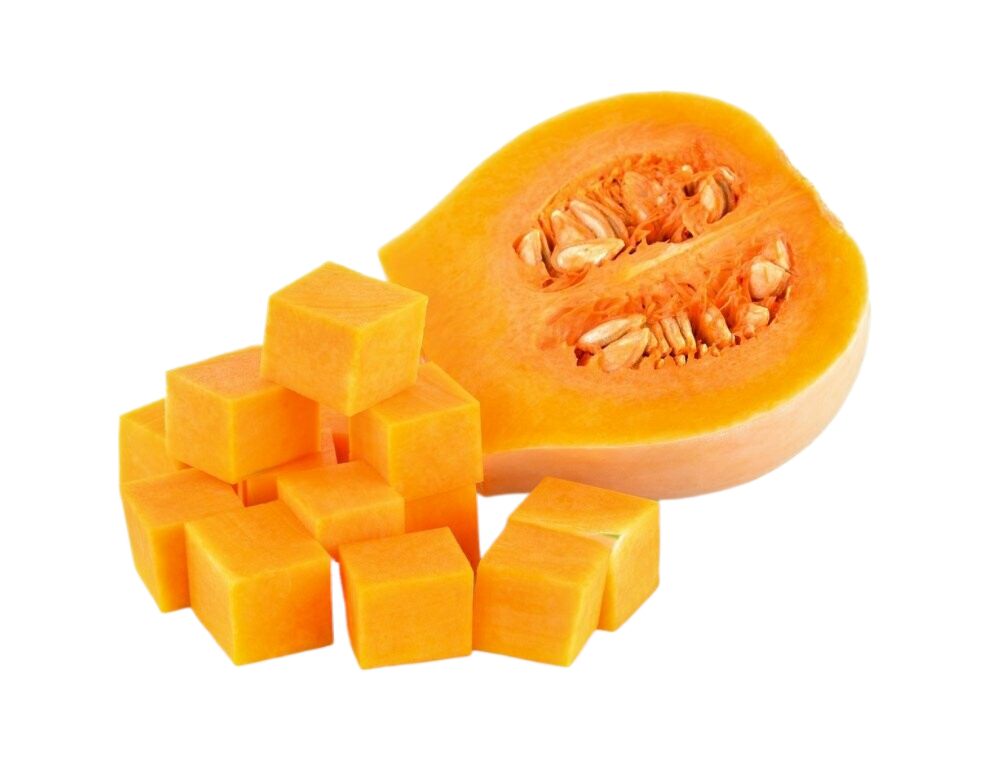A sliced butternut squash next to a pile of cubes of pumpkin