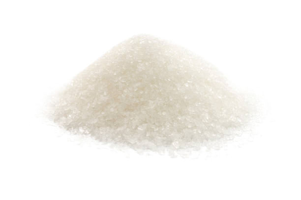A pile of white sugar on a white background
