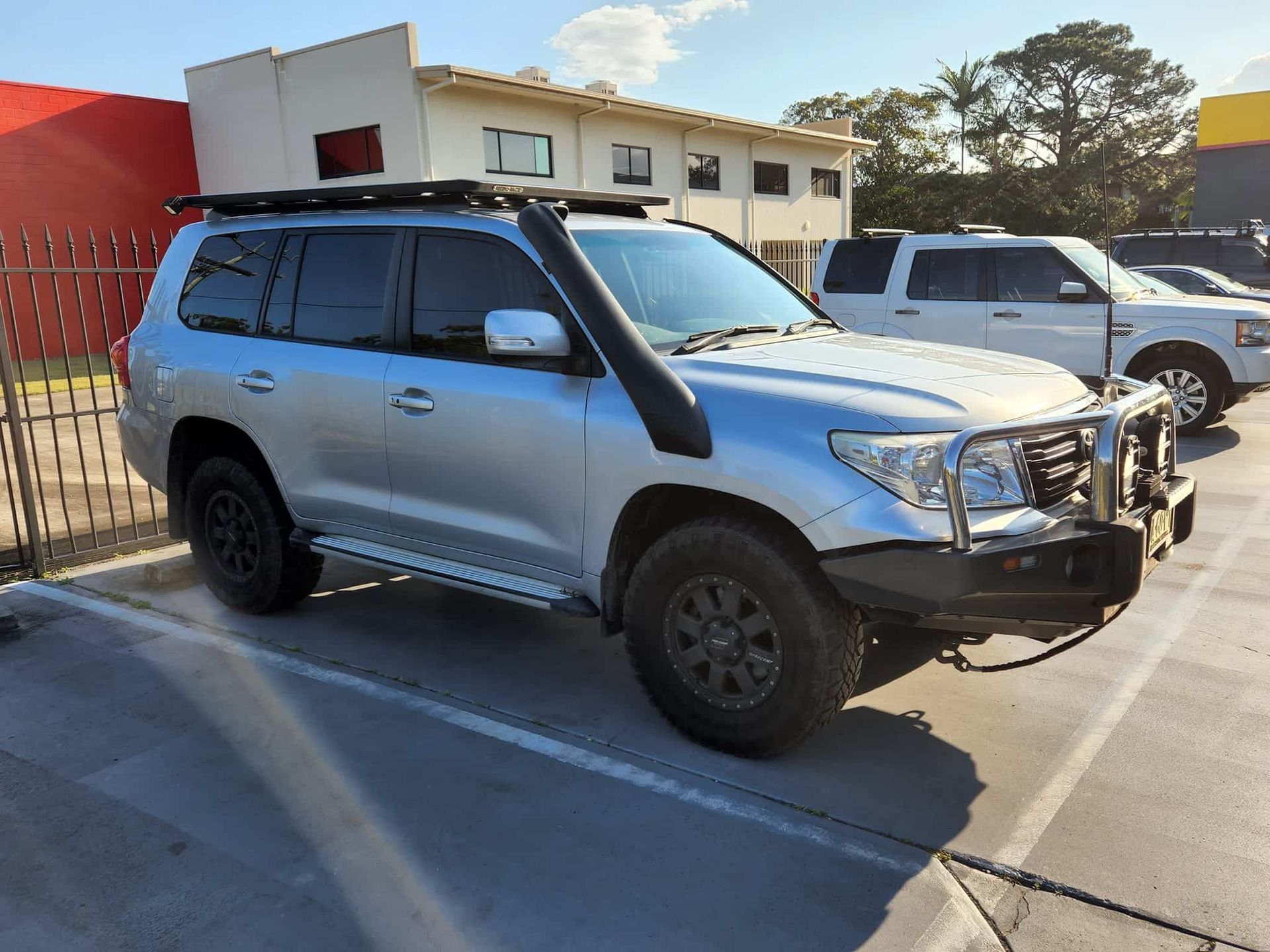 Silver Suv With Black Roof Rack and Snorkel Parked in a Lot — GZM 4x4 Performance In Ballina, NSW