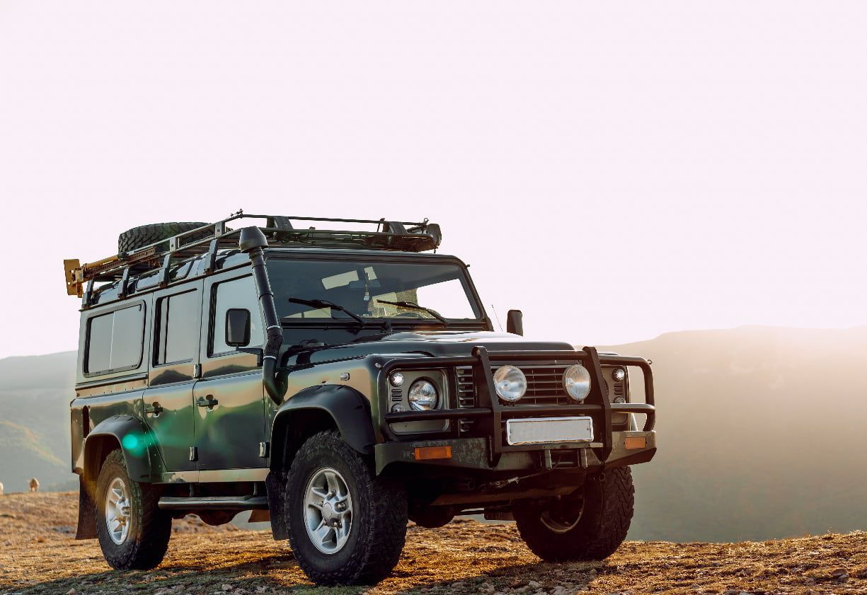 A Black Jeep is Parked on Top of a Dirt Hill — GZM 4x4 Performance In Tweed Heads, NSW